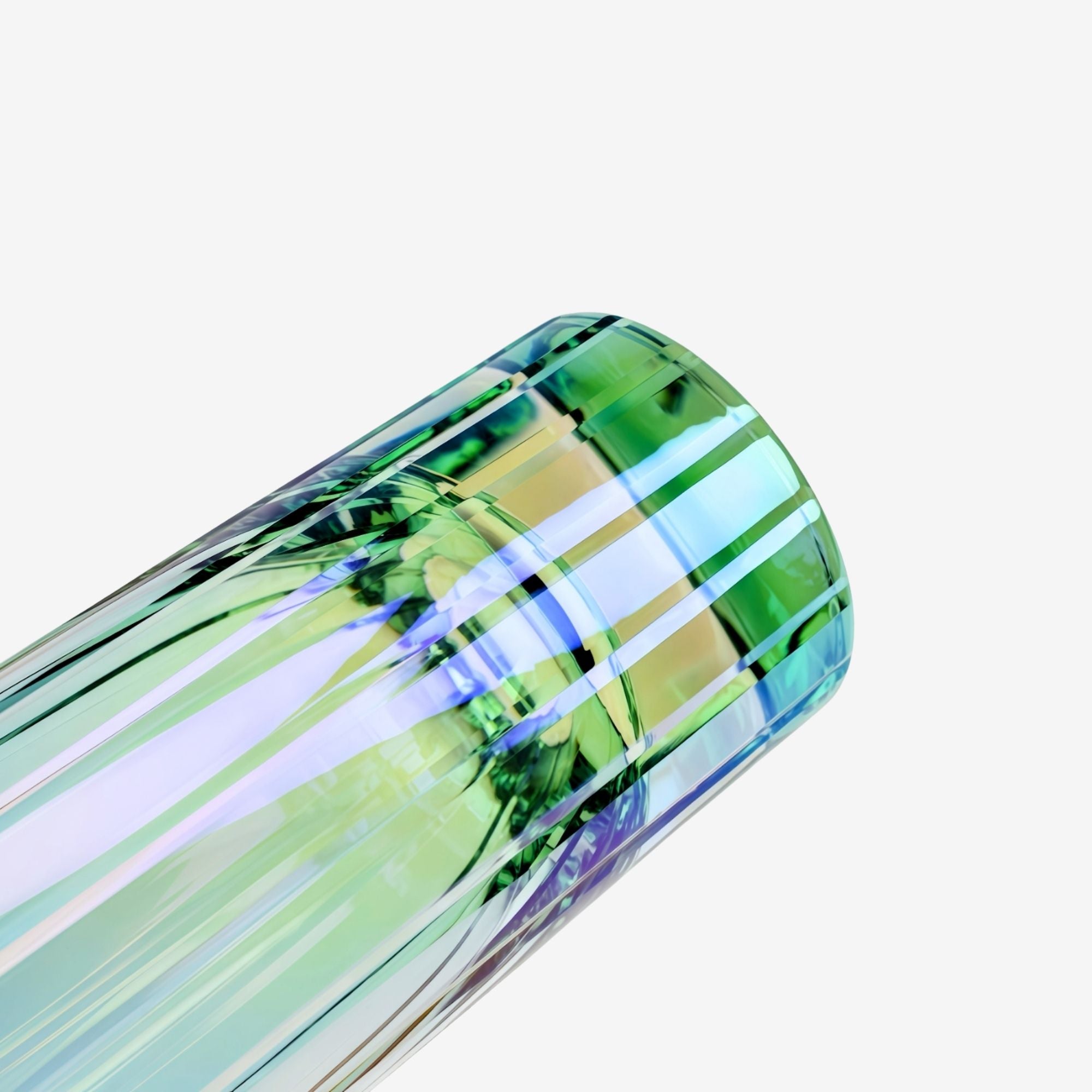 A close-up, angled macro shot of the Prismatic Crystal Highball Glass, highlighting the vibrant, iridescent finish and the light-refracting cuts.