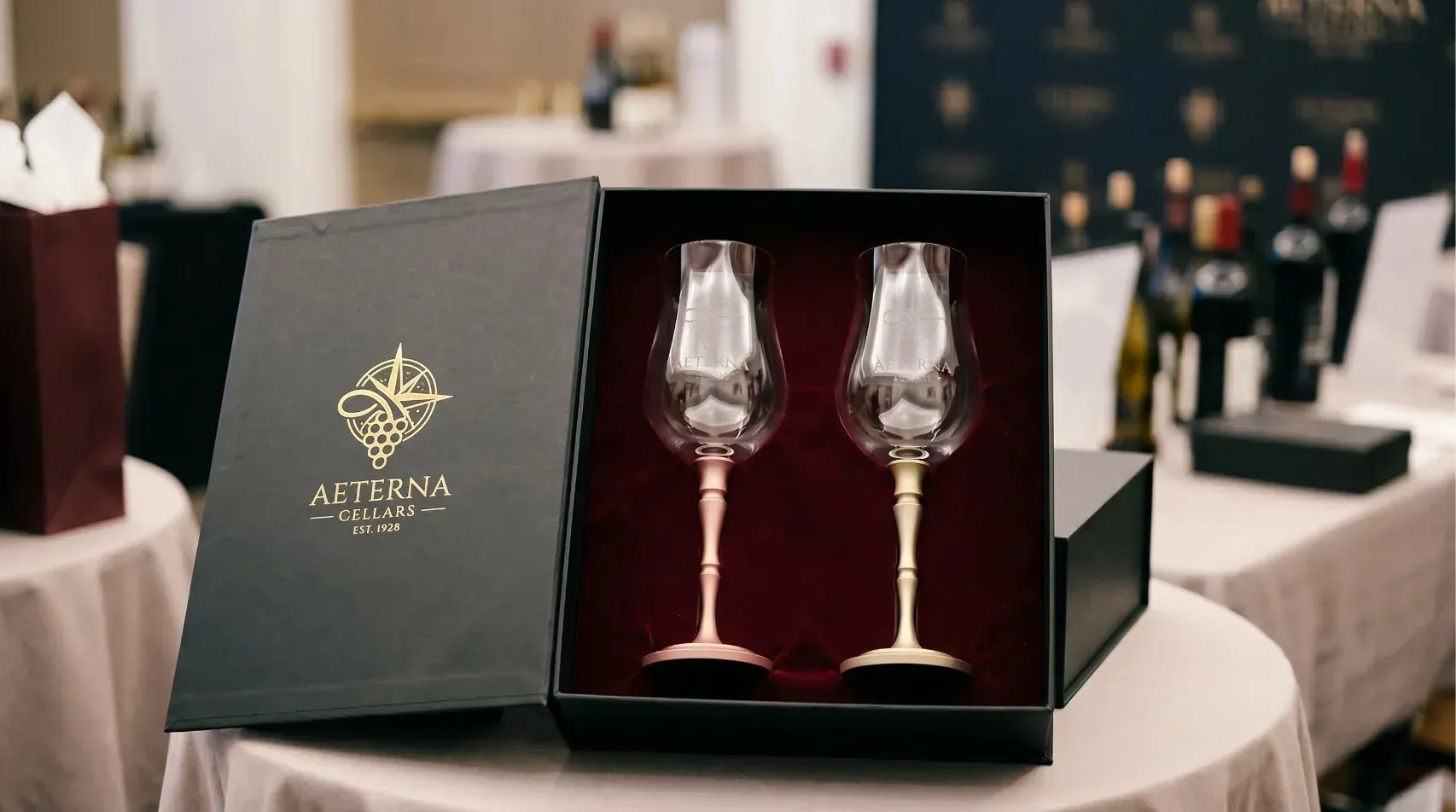 Premium B2B branded merchandise set with decanter, glasses, and custom retail presentation